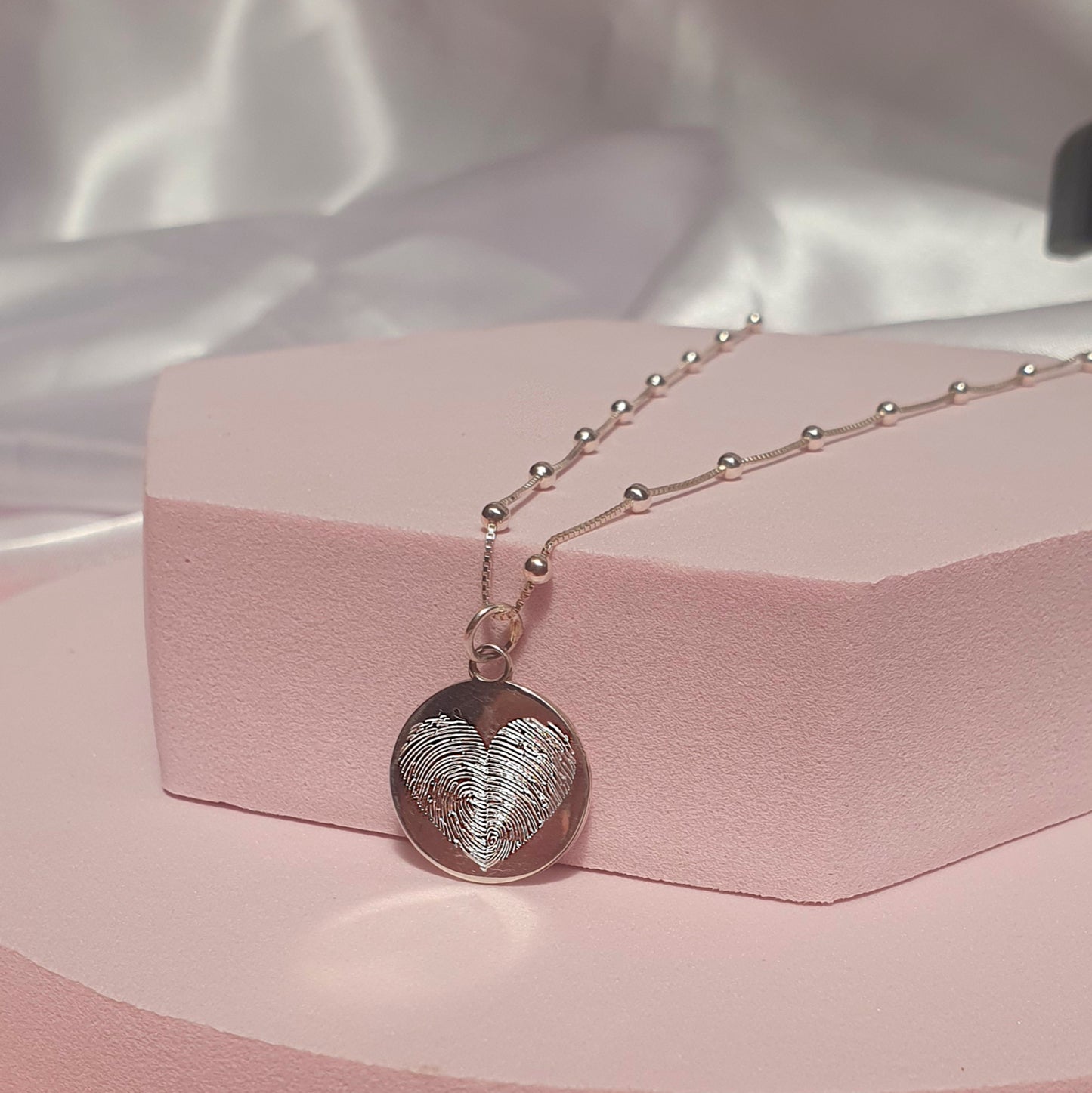 Collar huella digital doble